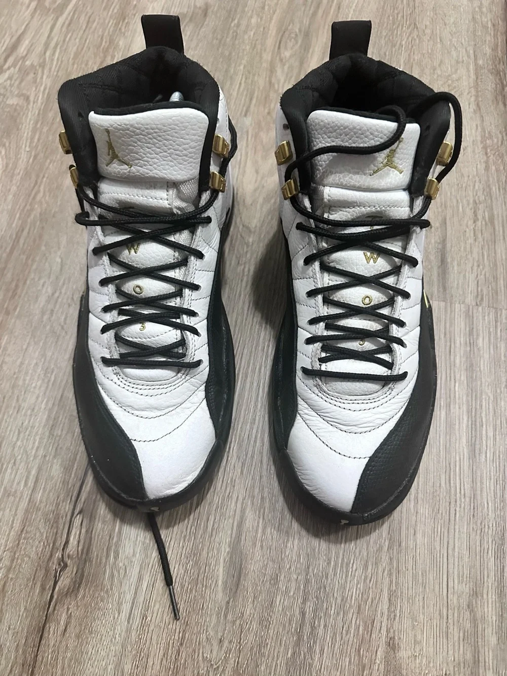 Jordan Men's White and Black High-Top Sneakers with Gold Accents